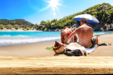 Desk of free space for your decoration. Beach landscape with two lovers on sand. Summer time. 