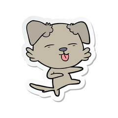 sticker of a cartoon dog dancing