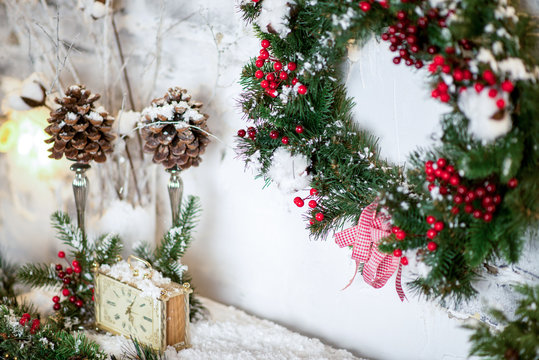 New Year decorated. Interior bright room with Christmas decoration. Fir-tree, gift boxes, fireplace decorated with garlands holiday. Celebration photo