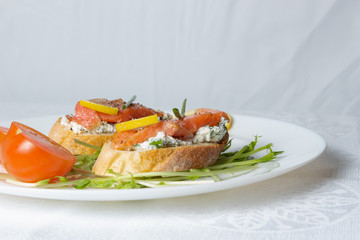 Appetizer of fresh sea salmon and ricotta.