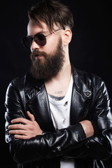 Obraz premium fashionable handsome man in sunglasses