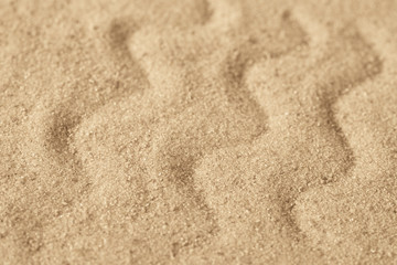 wave pattern on sand background texture