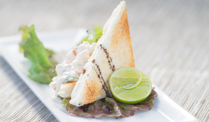 Seafood mayonnaise with toast, Appetizer. Fine Food set.