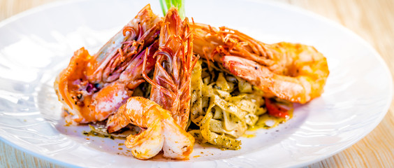 Fine dining organic food pasta with prawns and mussel seafood