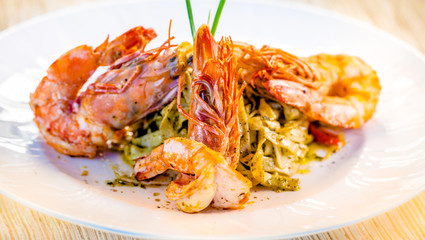 Fine dining organic food pasta with prawns and mussel seafood