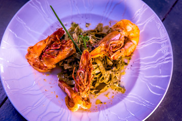 Fine dining organic food pasta with prawns and mussel seafood