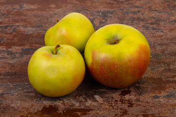 Ripe apples over background