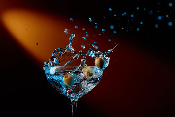 Dry martini with green olives.