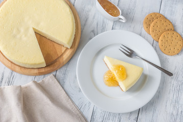 Traditional cheesecake on the wooden table