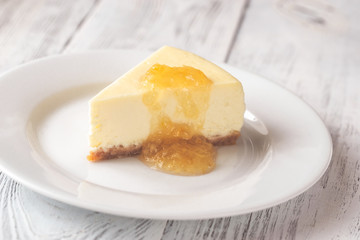 Traditional cheesecake on the wooden table