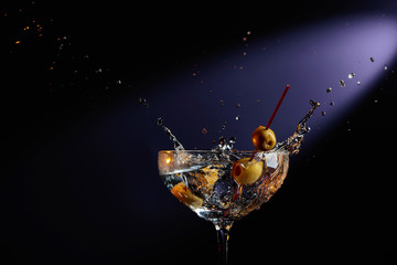 Dry martini with green olives.