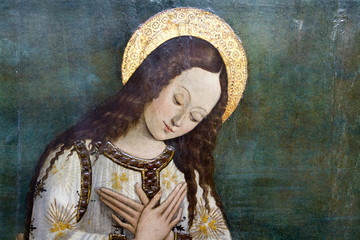 Pavia, Italy. 2017/11/11. The painting of Madonna adoring the infant Jesus by Giovani Ambrogio...