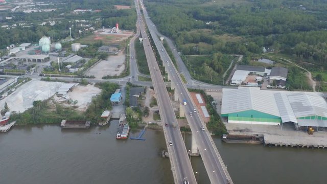 aerial photography sunset above Sri Surat bridge across Tapee river Surat Thani Thailand