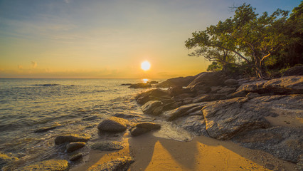 Sunset on a rocky beach
