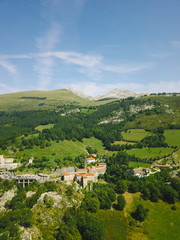 Fototapeta na wymiar green plain with a view.