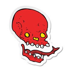 sticker of a cartoon spooky skull