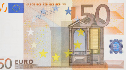 3360_A_new_50_Euro_bill_on_the_table.jpg