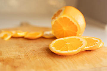 Sliced orange on cutting board