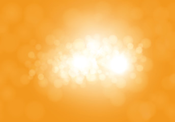 Vector golden yellow abstract summer or autumn background with bright flashes, light rays and bokeh effect