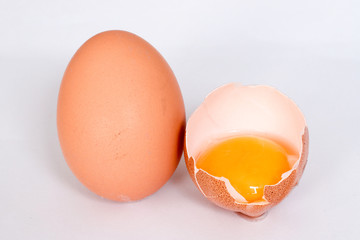 Raw brown chicken eggs on white background 