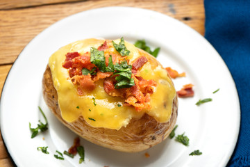 Baked potato with bacon and cheese