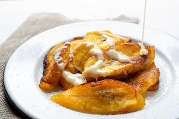 Sweet fried plantain with condensed milk