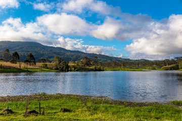 Perimbo dam lake, with many trees and lawn in the surroundings, Petrolandia, Santa Catarina, Brazil