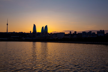 Sunset of Baku, Azerbaijan . Fire towers in the night