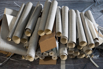 rolls of cropped Wallpaper in a pile