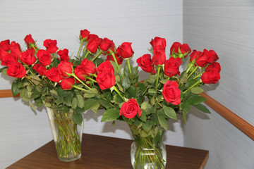 Bouquets of red roses on the table