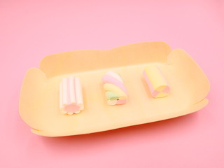 Colorful MARSHMALLOWS on Pink Background