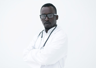 portrait of a responsible young doctor on a light background.