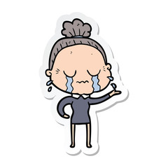 sticker of a cartoon crying old lady
