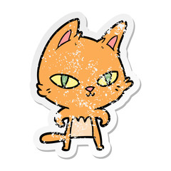 distressed sticker of a cartoon cat staring