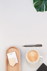 coffee pen business cup paper notepad bowltop view with copy space for your text. flat lay. 