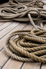 Fototapeta na wymiar Chaotic old ropes on a ships deck