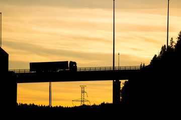 truck on a bridge silhouette