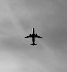 Commercial aircraft is flying above