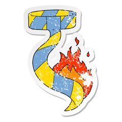 distressed sticker of a cartoon burning tie