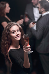 stylish young woman with glass of champagne