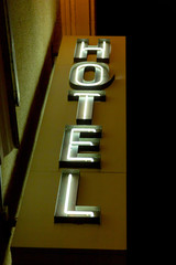 Illuminated hotel sign on facade © Björn Kristersson