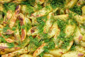 French fries Baked potatoes with greens. Russian potato slices