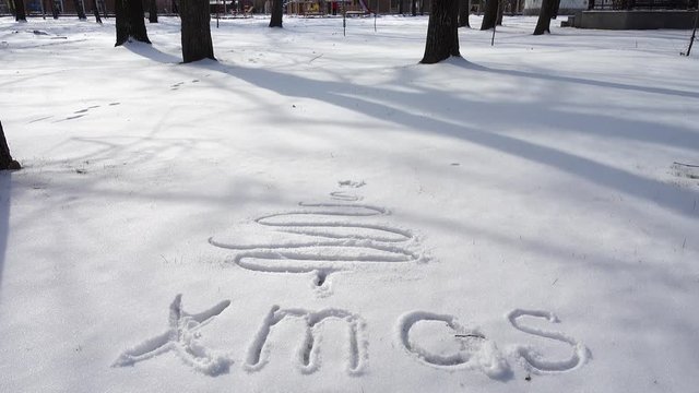 The inscription Xmas on snow.