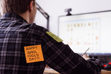 1 april fools day. Funny day. April fish. Prank. Inscriptions on the back. Stickers with jokes. Tric at work. Fun colleagues.Back with sticker