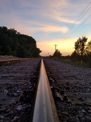 Fototapeta premium Looking down the train tracks