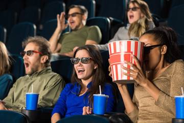 Fototapeta premium People screaming while watching a 3D movie at the cinema