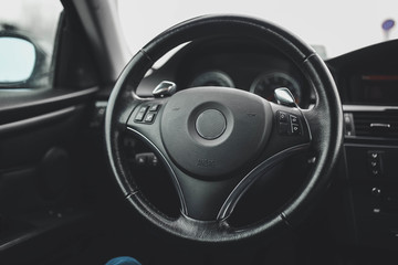 steering wheel, interior of a modern business car