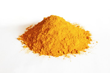 turmeric or curcumin longa powder heap isolated on white background