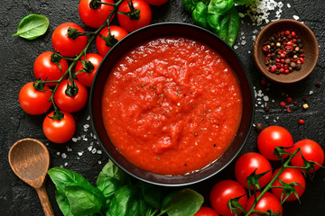 Homemade tomato sauce passata - traditional recipe of italian cuisine.Top view with copy space. - obrazy, fototapety, plakaty