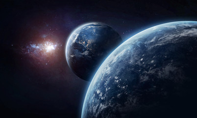 Obraz na płótnie Canvas Earth and other planet with atmosphere in deep space. Galaxy on the background. Civilization. Elements of this image furnished by NASA